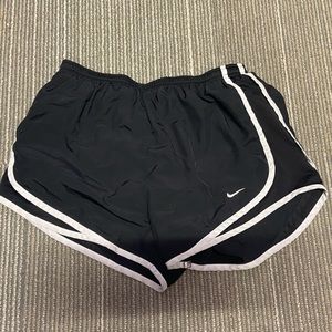 Nike: black and white nike athletic shorts